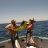 Another happy customer with a Dolphin Fish (Mahi Mahi) aboard the Mahi Mahi 11