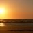 Sunset at low tide looking out to the ocean