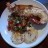 BBQ Crayfish halves with Olive & Tomato Salad and fried Potatos
