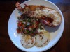 BBQ Crayfish halves with Olive & Tomato Salad and fried Potatos