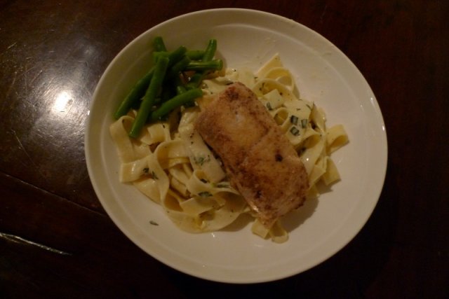 Almond-crusted dolly with pasta and green beans